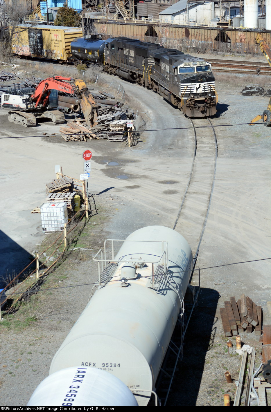 NS yard job E19  working the interchange yard with CSX and the cars he brought "down the hill" from NS's Montview Yard in the foreground